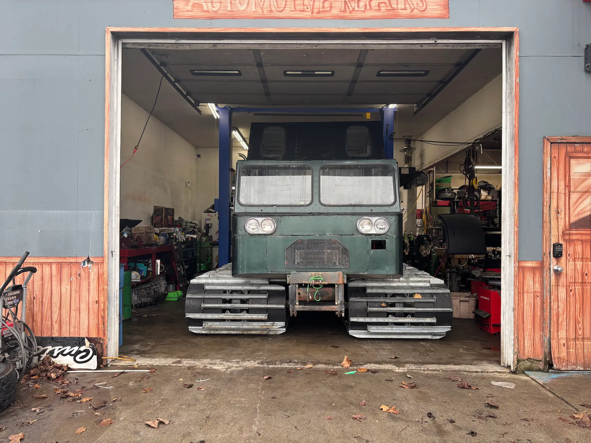 Tracked vehicle inside the Cascade Auto and Marine service bay